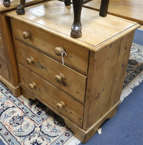 A pine three drawer chest W.75cm.